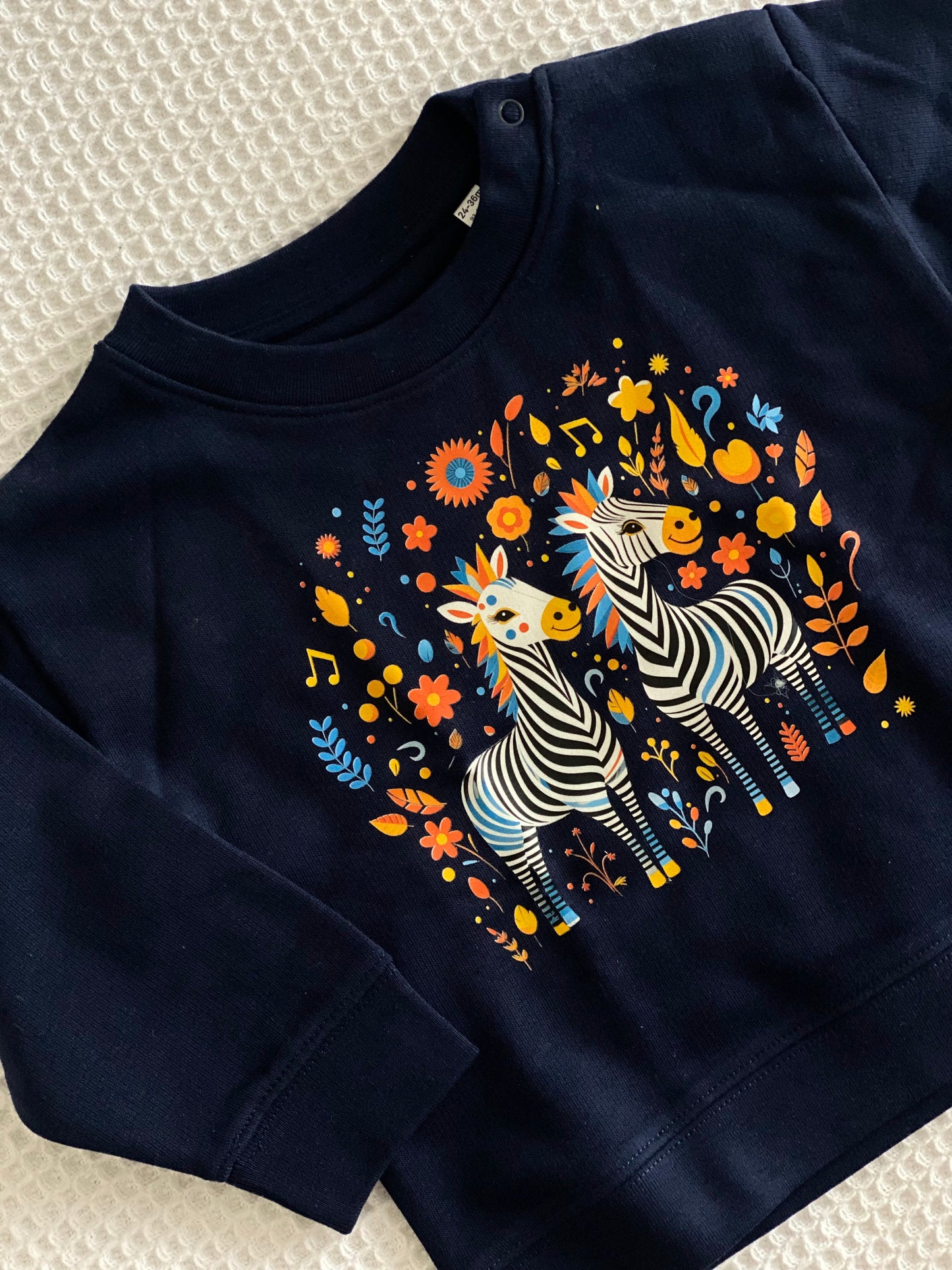 Fröhliche Zebras – Bio-Babypullover